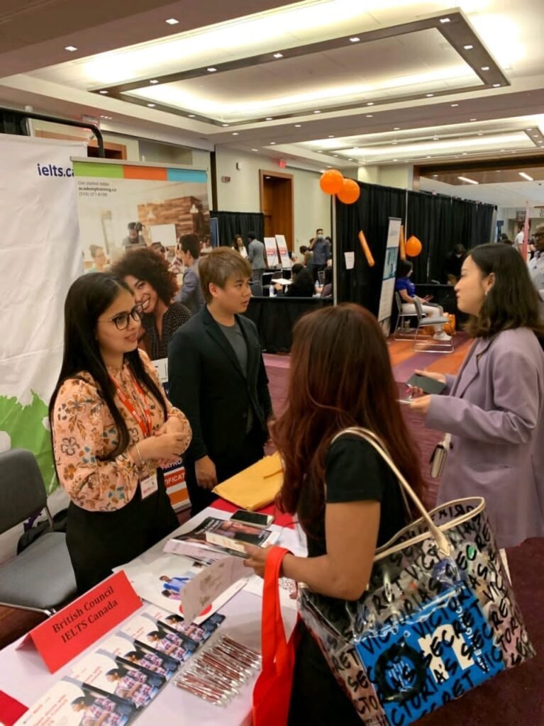 Gratis Gagan Institute meeting candidates at an IELTS fair
